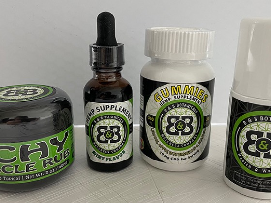 B and B Botanicals product line with green and black printed labels on jars and bottles