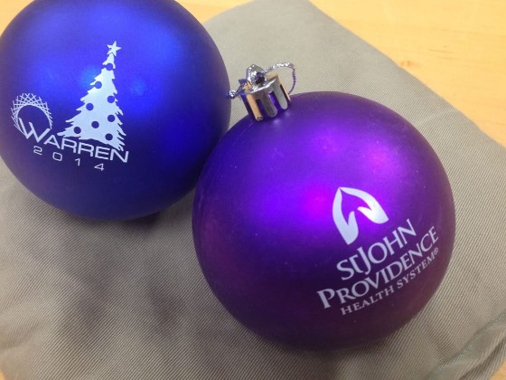 Blue and purple printed ornaments, one for Warren and one for St. John Providence