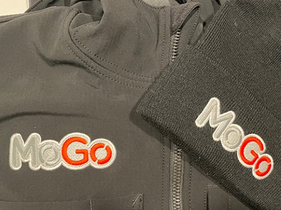 MoGo bike share soft-shell jacket and knit beanie with embroidered logos
