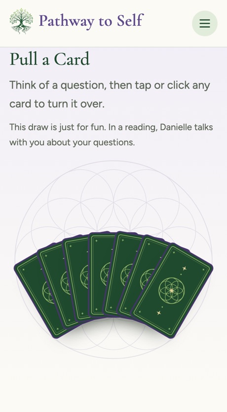 The Pull a Card section of the Pathway to Self website on a phone, seven cards fanned face down