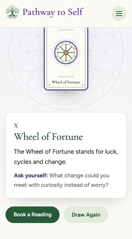 Under the card, what the Wheel of Fortune stands for, a question to ask yourself, and the Book a Reading and Draw Again buttons